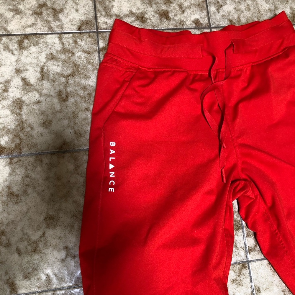 Balance athletics orange joggers